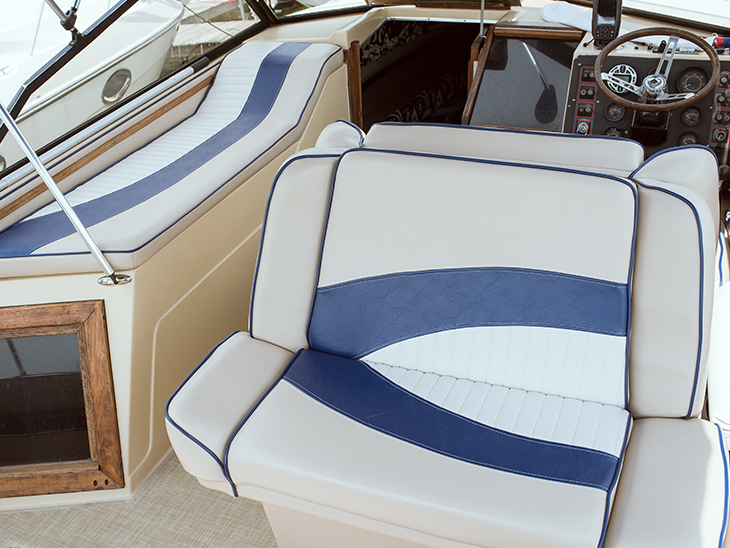Seating on the bridge deck of the 2016 project power boat in Seabrook vinyl.
